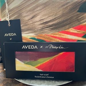 AVEDA hair scarf features limited edition Aveda x 3.1 Phillip Lim